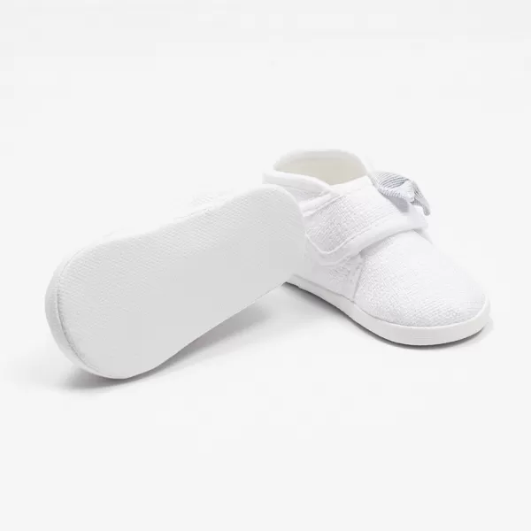 New Baby Kojenecké capáčky s mašličkou bílá 0-3 m