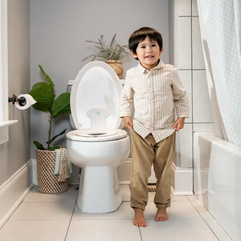 INGENUITY Redukce na WC bílá Flip & Sit™