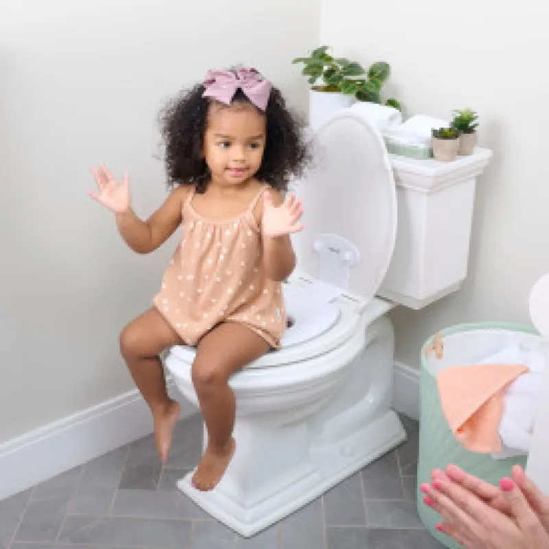 INGENUITY Redukce na WC bílá Flip & Sit™