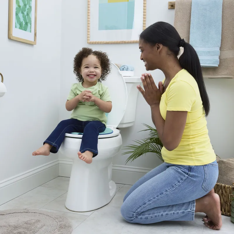BRIGHT STARTS Redukce na WC nalepovací Flip & Sit™ STITCH™ 18m+, do 23kg