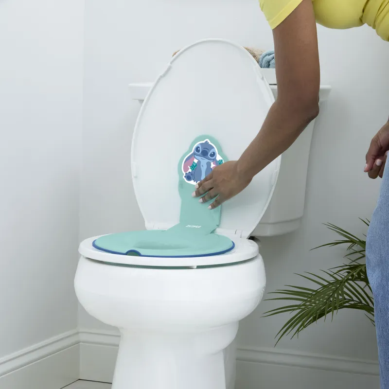 BRIGHT STARTS Redukce na WC nalepovací Flip & Sit™ STITCH™ 18m+, do 23kg