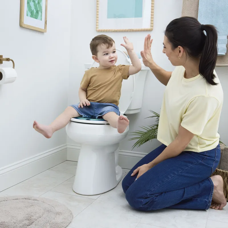 BRIGHT STARTS Redukce na WC nalepovací Flip & Sit™ STITCH™ 18m+, do 23kg