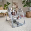 INGENUITY Houpačka konvertibilní cestovní s melodií Bella Teddy™ 0m+ do 9kg