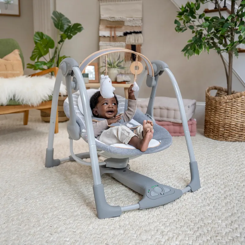 INGENUITY Houpačka konvertibilní cestovní s melodií Bella Teddy™ 0m+ do 9kg