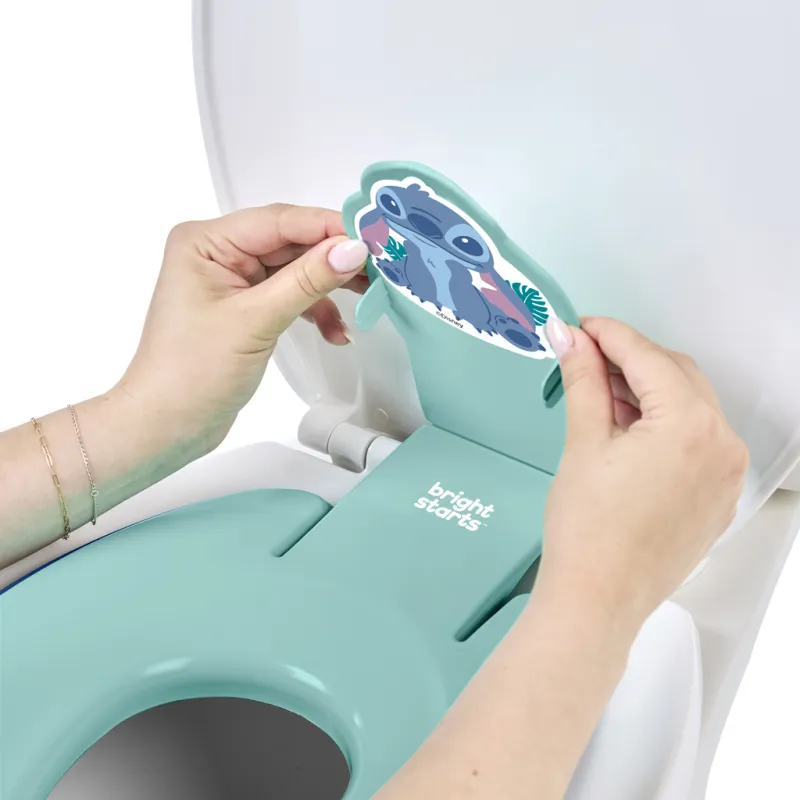 BRIGHT STARTS Redukce na WC nalepovací Flip & Sit™ STITCH™ 18m+, do 23kg