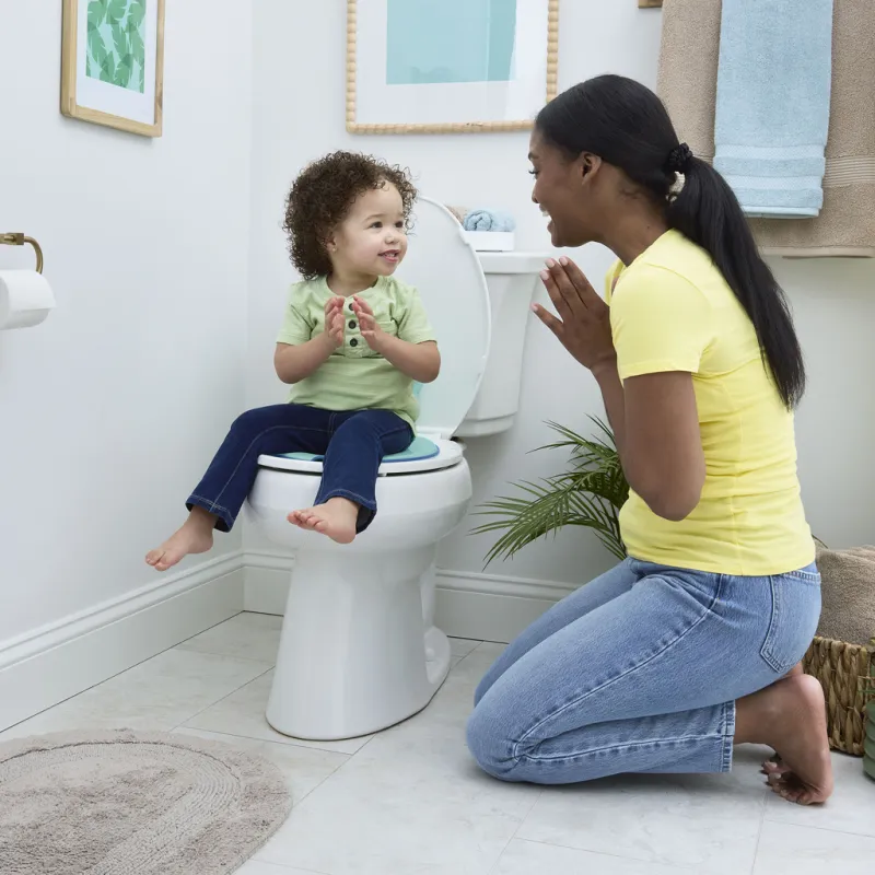 BRIGHT STARTS Redukce na WC nalepovací Flip & Sit™ STITCH™ 18m+, do 23kg
