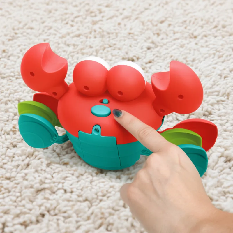 BRIGHT STARTS Hračka hudební a multisenzorická Rockin' Crawling Crab™, 6m+